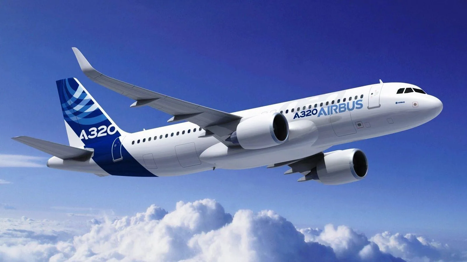 Airbus A320 aircraft in flight above the clouds