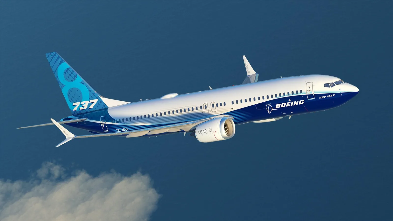 Boeing 737 MAX aircraft in flight over the sea